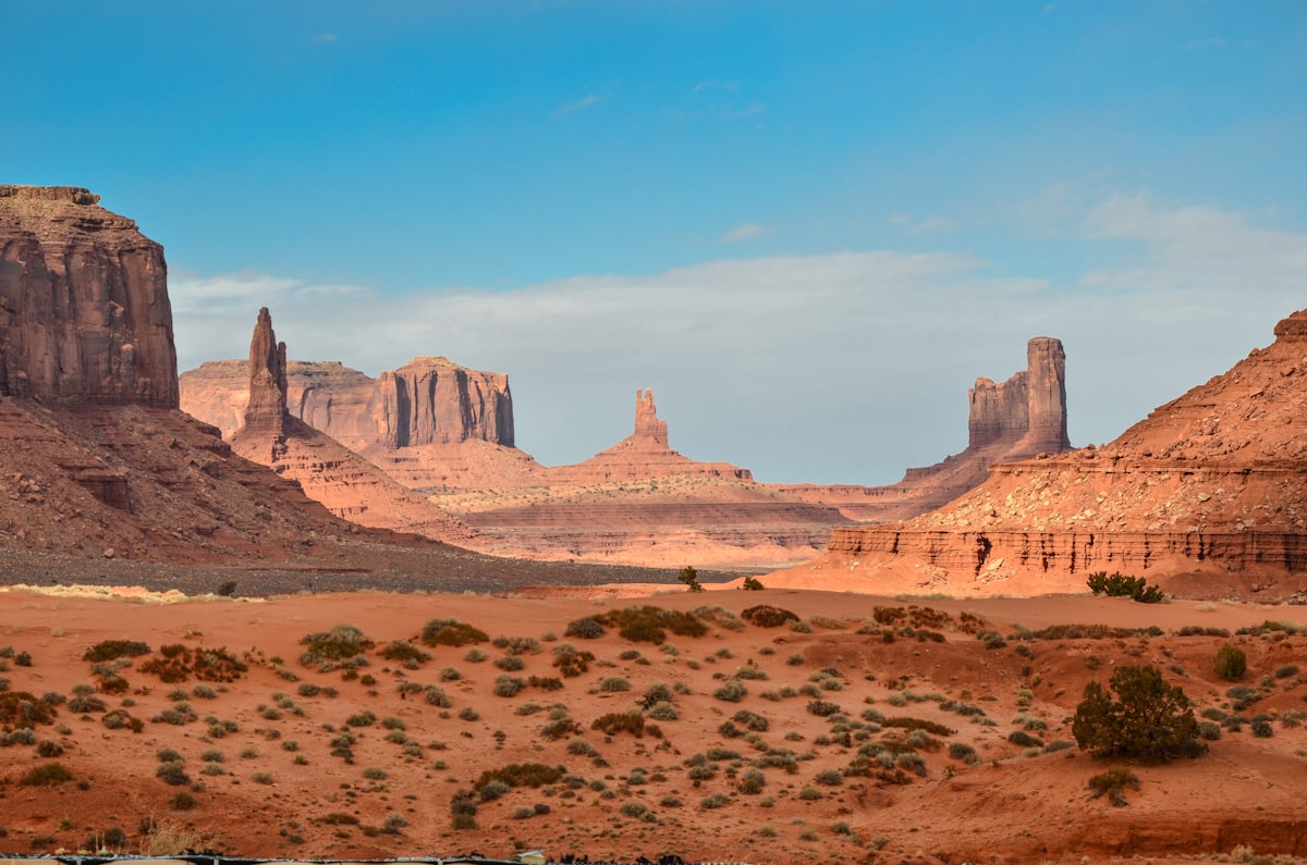 Sedimentary rock strata at Monument Valley — the kind of layered subsurface Inside Earth verifies through ambiguous seismic data